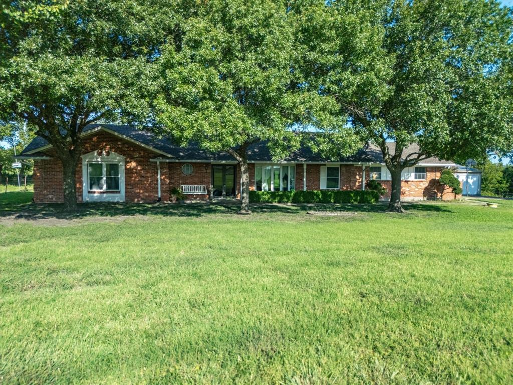 2690 Kelly Road Aledo, TX 76008 - Photo 3 of 19 Single story home featuring brick siding and a front yard