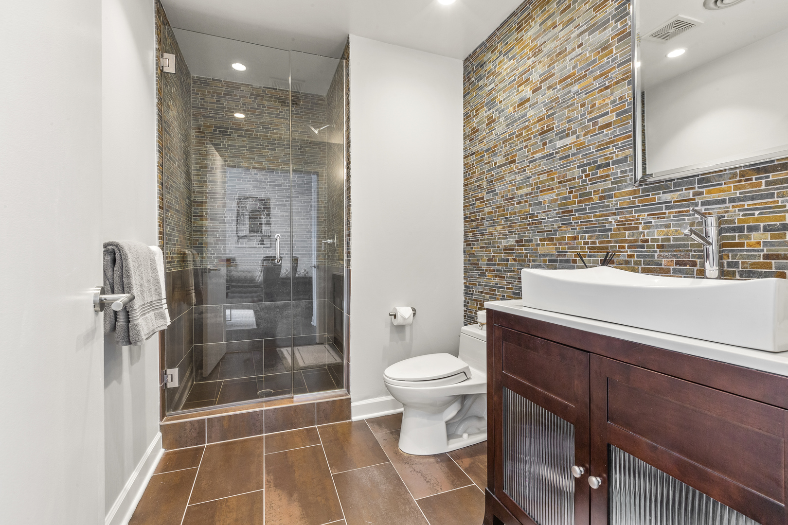 936 West Madison Street, Unit E4 Chicago, IL 60607 - Photo 19 of 21 a bathroom with a sink toilet and shower