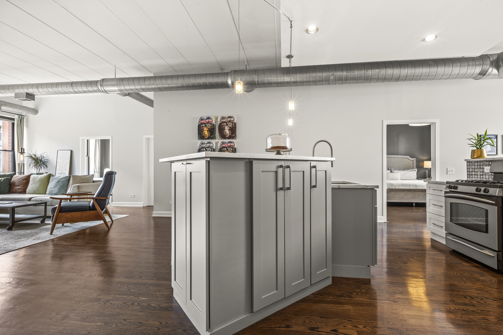 936 West Madison Street, Unit E4 Chicago, IL 60607 - Photo 6 of 21 a kitchen with stainless steel appliances granite countertop a refrigerator and a stove top oven