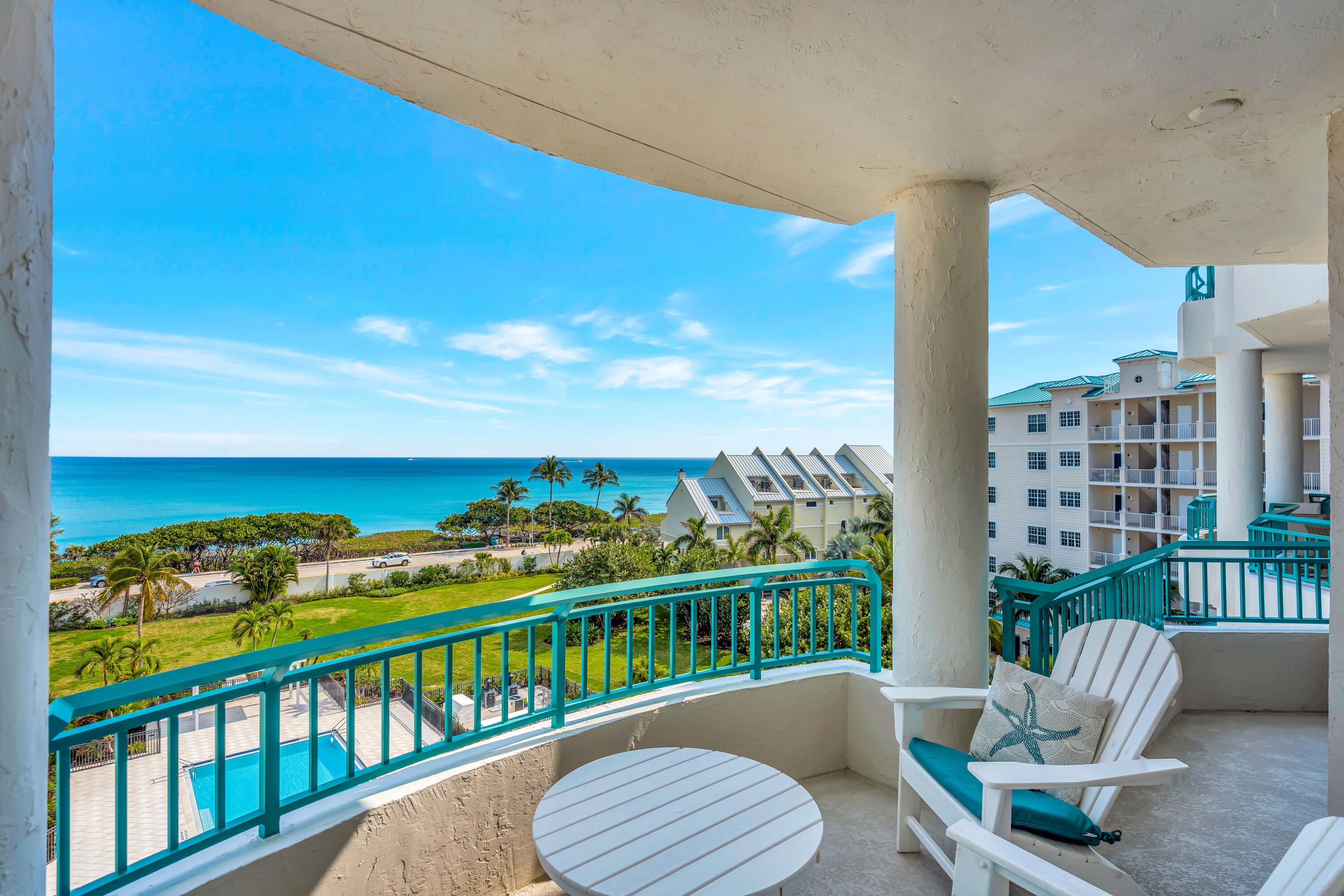 2000 Florida A1A, Unit N507 Jupiter, FL 33477 - Photo 14 of 78 a view of a chairs and table in patio