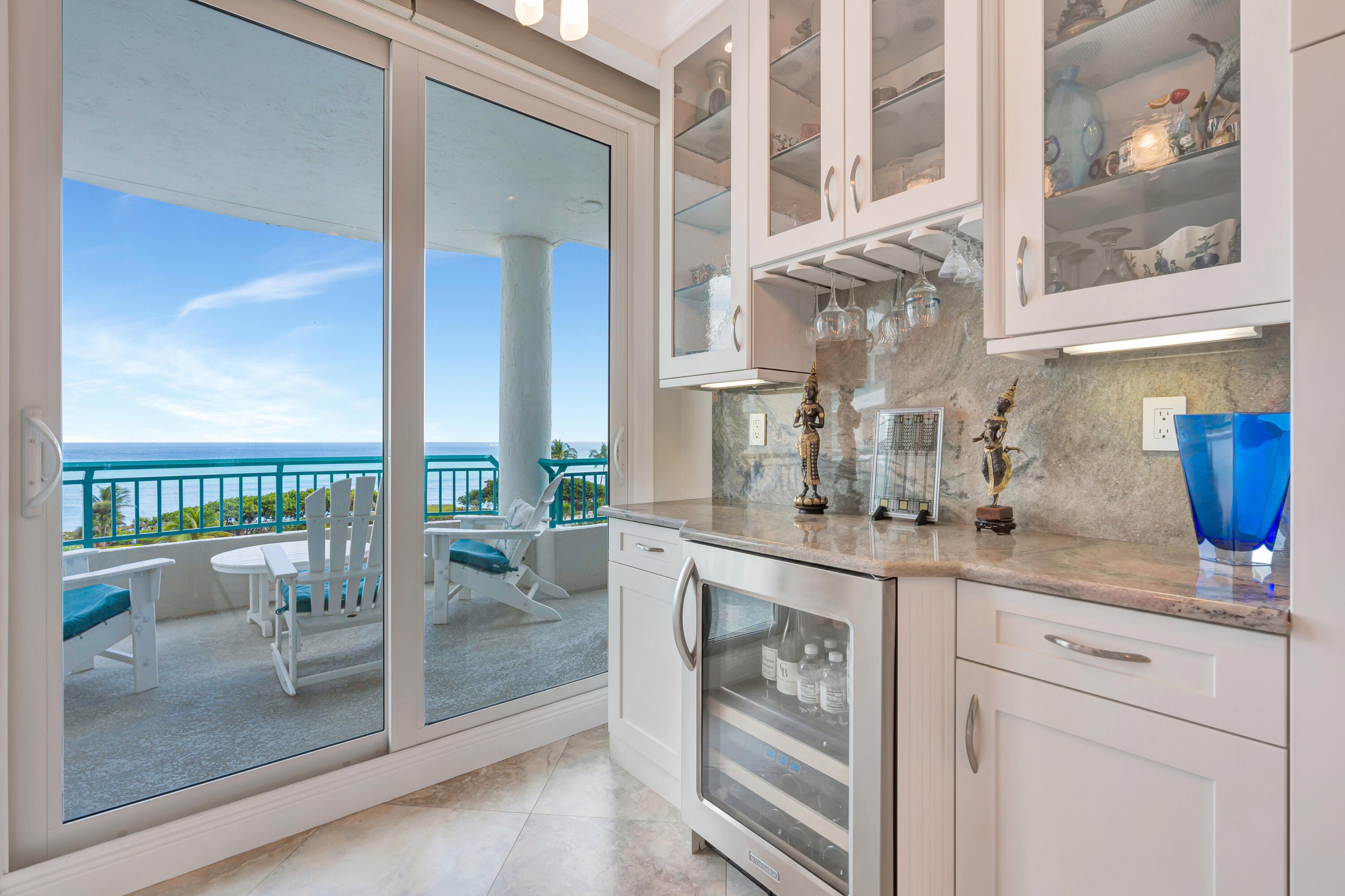 2000 Florida A1A, Unit N507 Jupiter, FL 33477 - Photo 31 of 78 a kitchen with stainless steel appliances granite countertop a sink and a cabinets