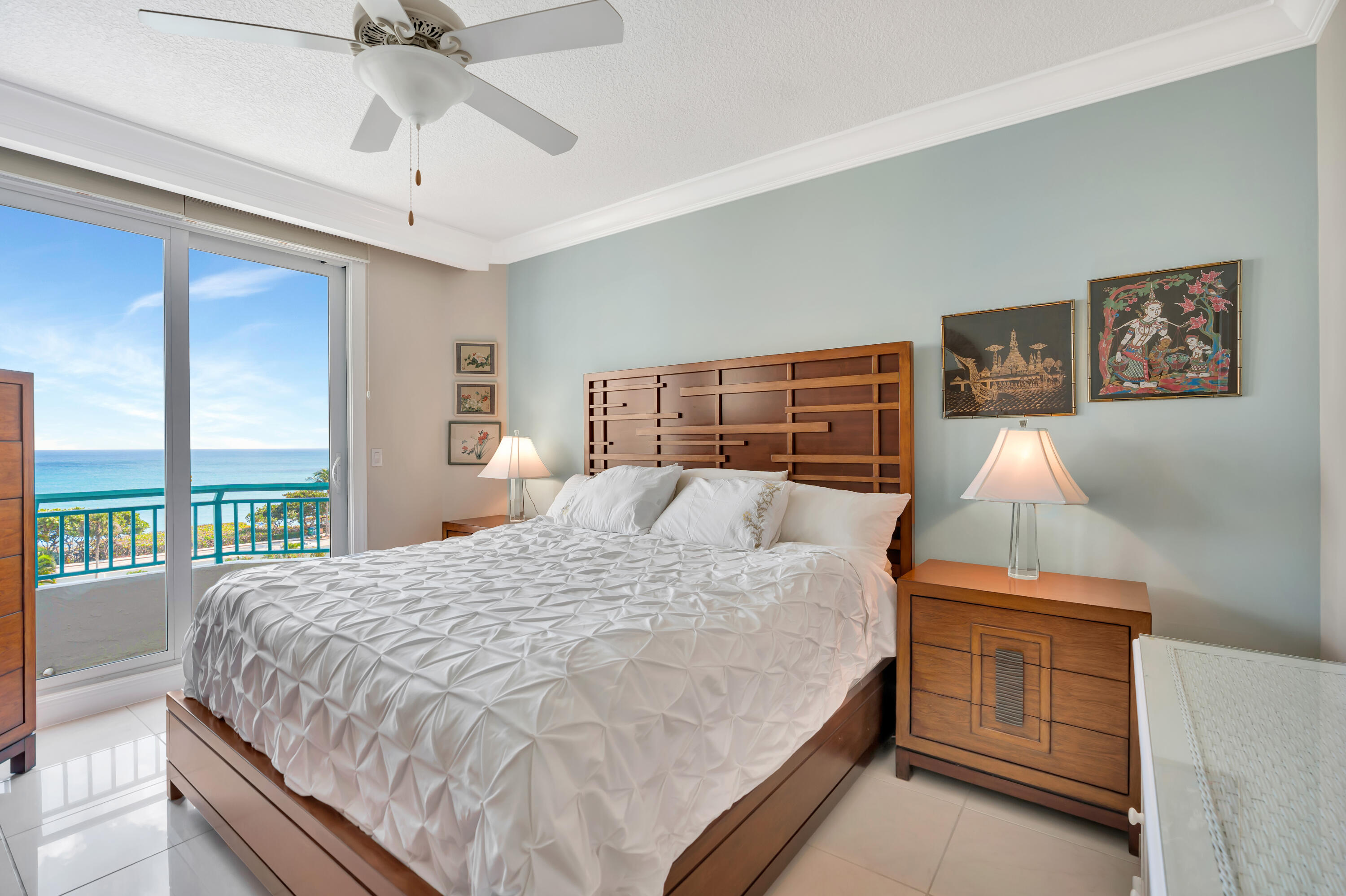 2000 Florida A1A, Unit N507 Jupiter, FL 33477 - Photo 37 of 78 a bedroom with a bed and wooden floor