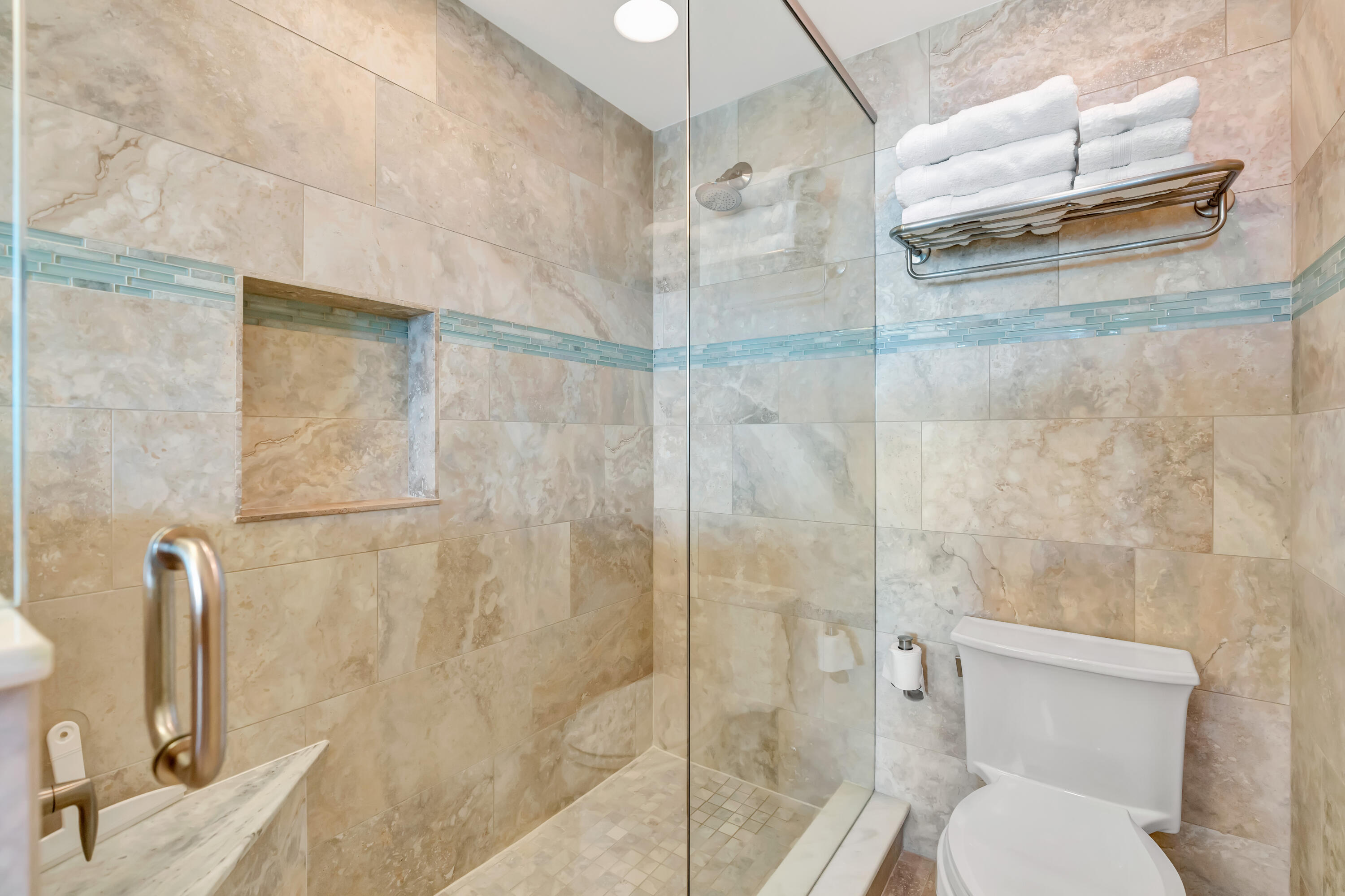 2000 Florida A1A, Unit N507 Jupiter, FL 33477 - Photo 44 of 78 a bathroom with a shower and toilet