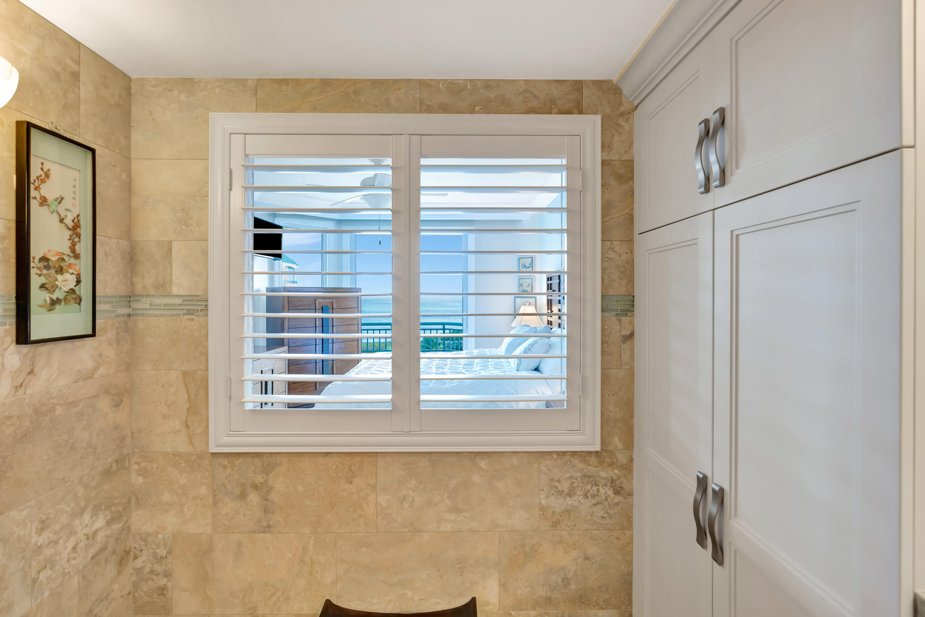 2000 Florida A1A, Unit N507 Jupiter, FL 33477 - Photo 49 of 78 a view of a room that has a window in it