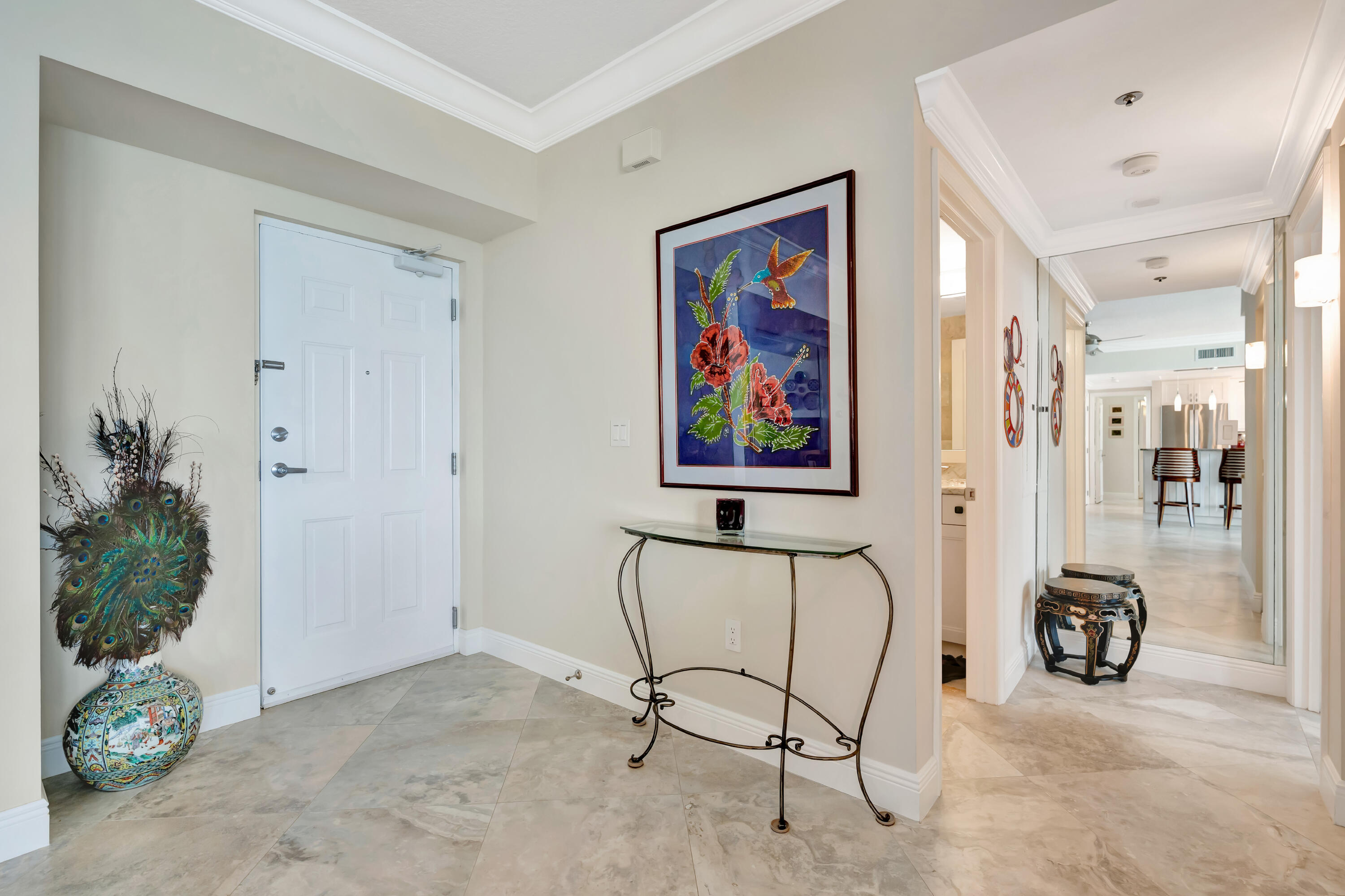2000 Florida A1A, Unit N507 Jupiter, FL 33477 - Photo 50 of 78 a view of a livingroom with furniture and a potted plant