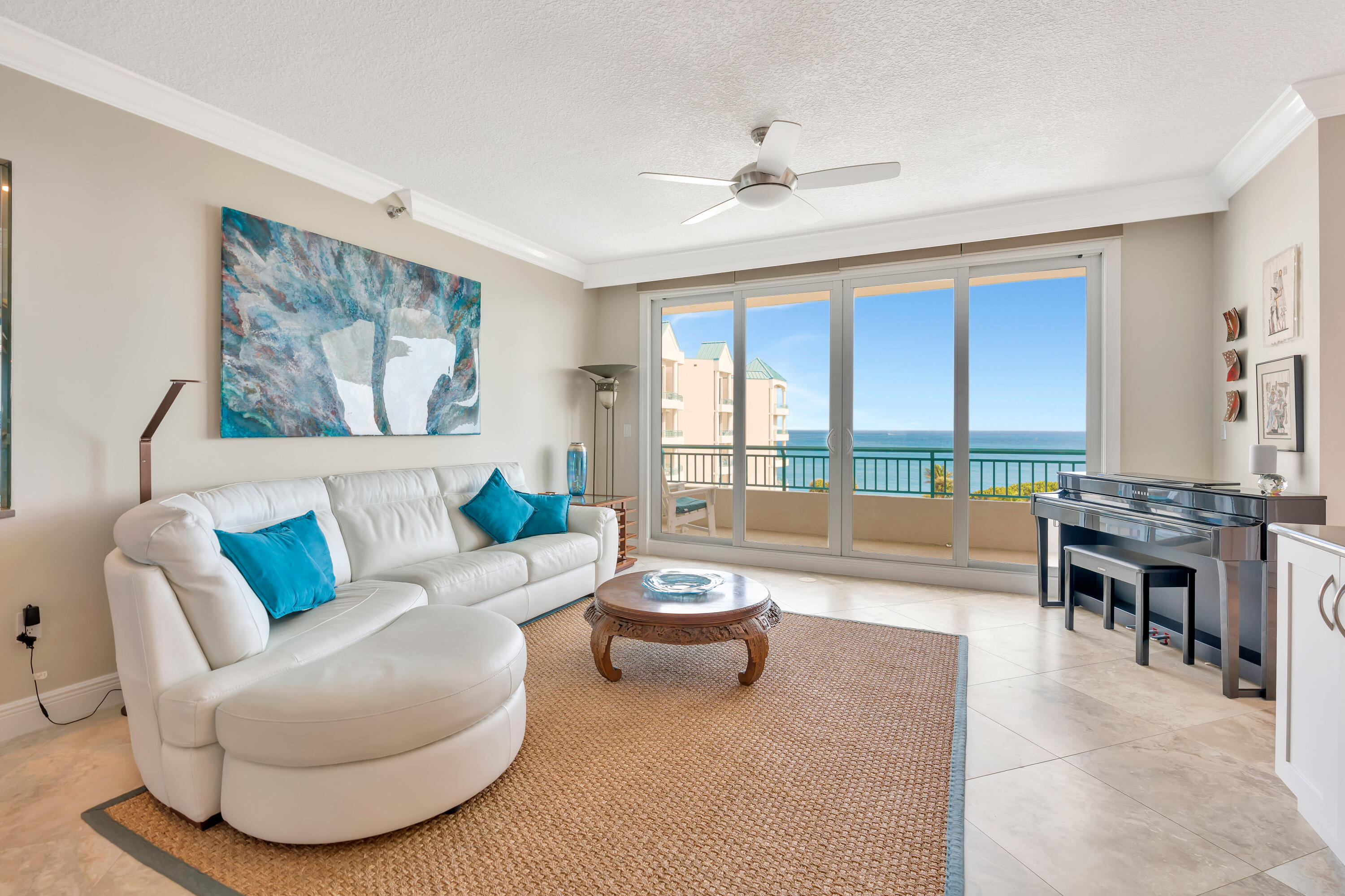 2000 Florida A1A, Unit N507 Jupiter, FL 33477 - Photo 9 of 78 a living room with furniture and a large window
