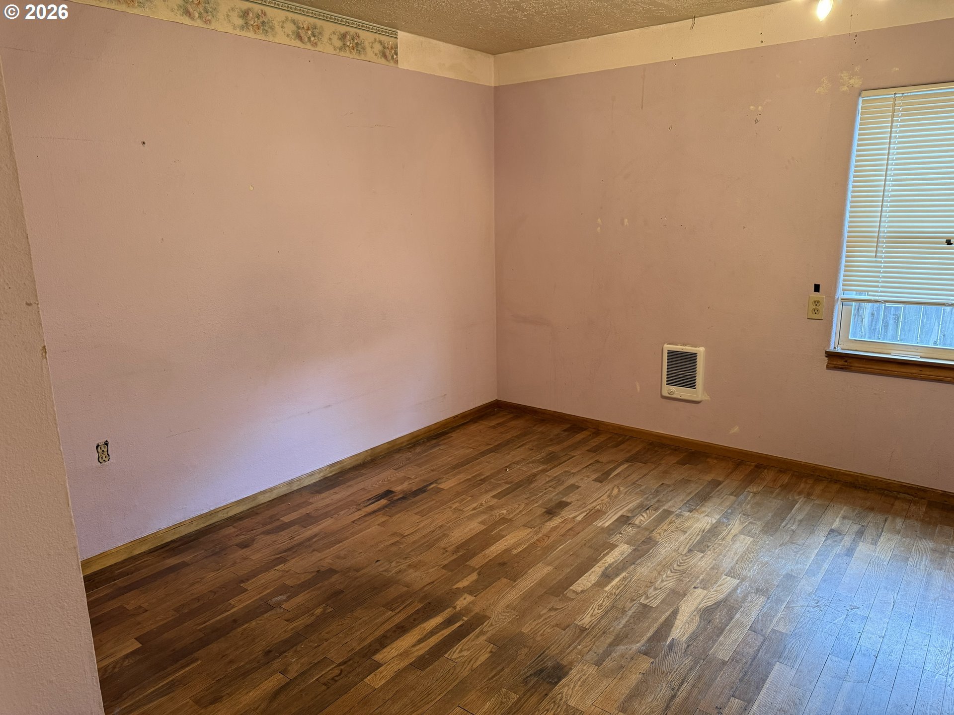 7451 Southeast Johnson Street Hillsboro, OR 97123 - Photo 15 of 27 a view of empty room with wooden floor and fan
