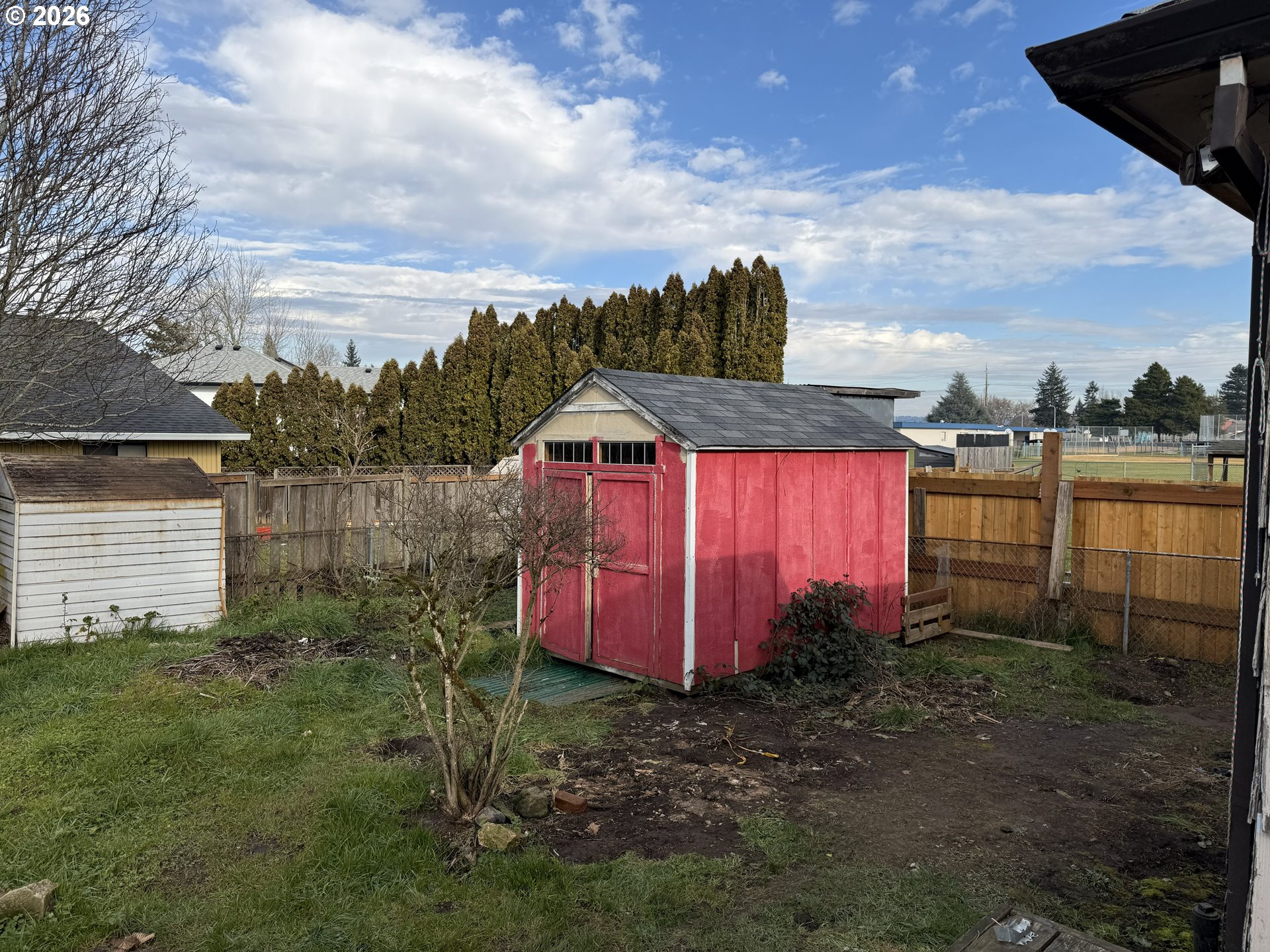 7451 Southeast Johnson Street Hillsboro, OR 97123 - Photo 24 of 27 a view of a house with backyard and garden