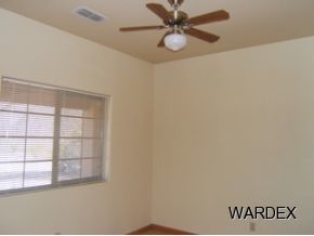 7945 South Hawk Road Kingman, AZ 86401 - Photo 15 of 24 an empty room with a window