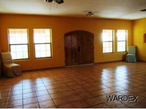 7945 South Hawk Road Kingman, AZ 86401 - Photo 3 of 24 a view of an empty room with a window