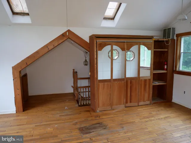 a view of entryway with wooden floor