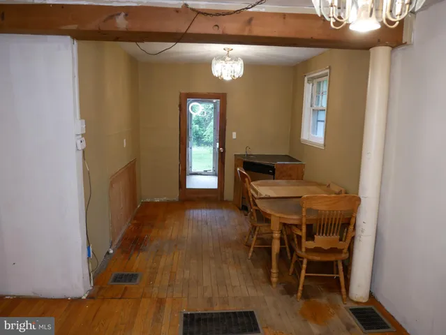 a view of a kitchen with a sink and dishwasher