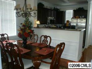152 Singleton Road Mooresville, NC 28117 - Photo 3 of 6 a view of a dining room with furniture