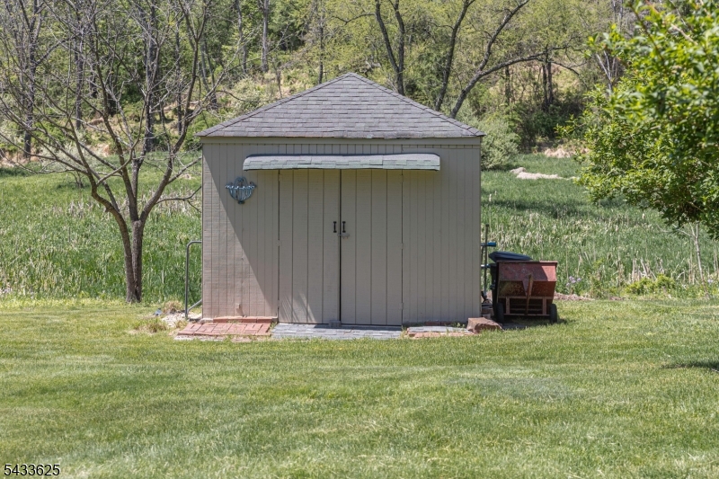 449 Stamets Road Milford, NJ 08848 - Photo 36 of 44 a backyard of a house with lots of green space