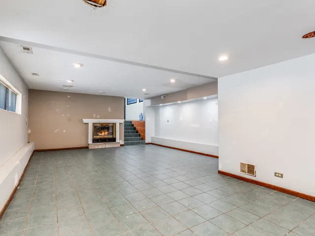 an empty room with a projector