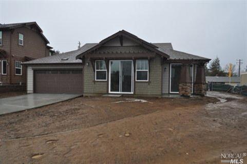 678 Canyon Road Novato, CA 94947 - Photo 1 of 1 a front view of a house with a yard and garage
