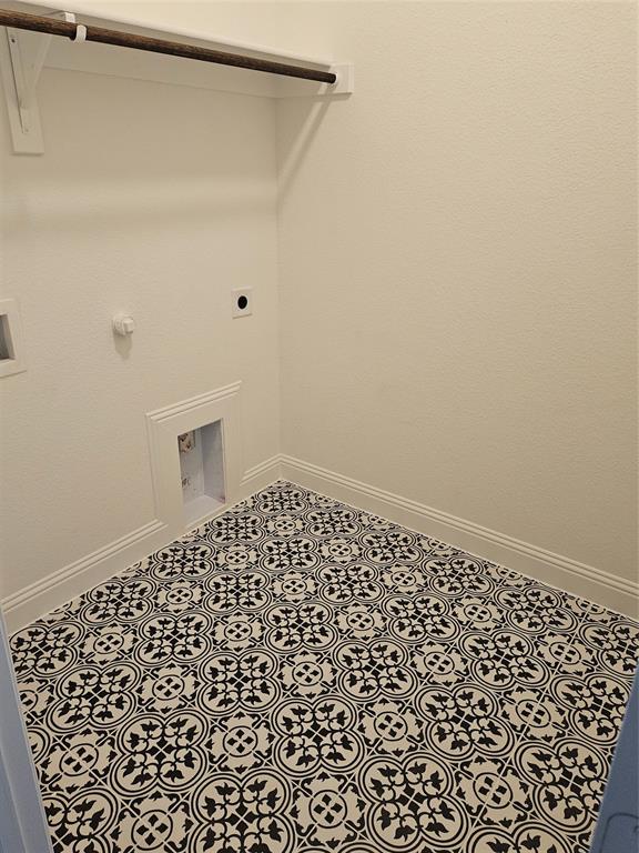 1507 Enloe Road Howe, TX 75459 - Photo 12 of 27 a bathroom with a shower curtain and a shower curtain