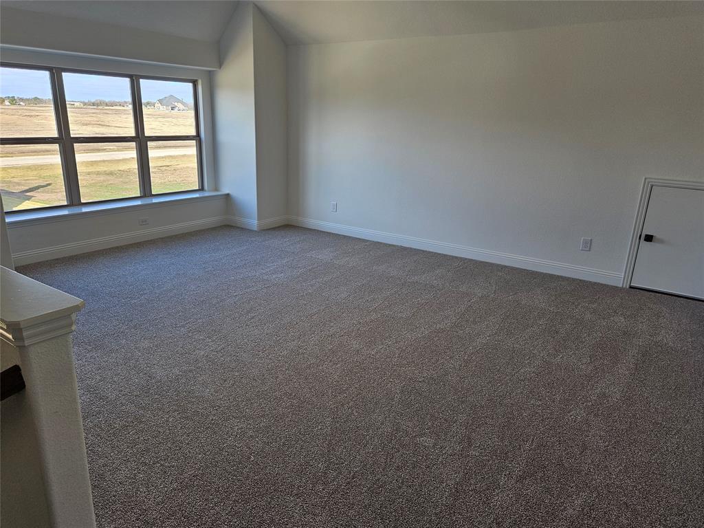 1507 Enloe Road Howe, TX 75459 - Photo 19 of 27 a view of an empty room with a window