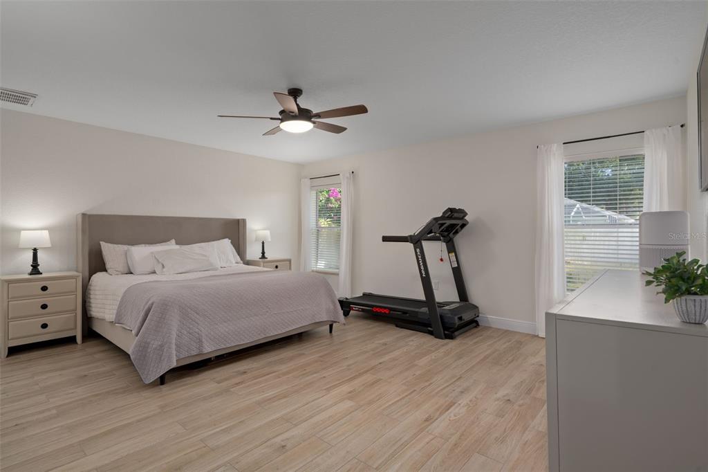 11370 Terrell Road Spring Hill, FL 34608 - Photo 4 of 54 a bedroom with a bed and a window