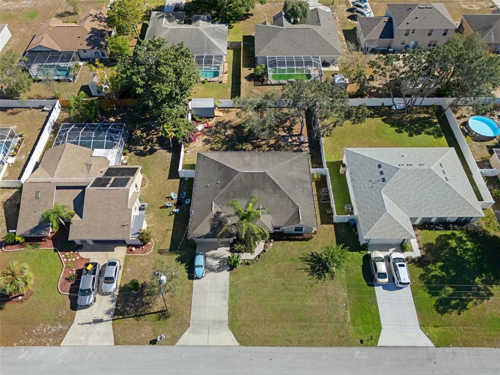 11370 Terrell Road Spring Hill, FL 34608 - Photo 52 of 54 an aerial view of a house with yard swimming pool and outdoor seating