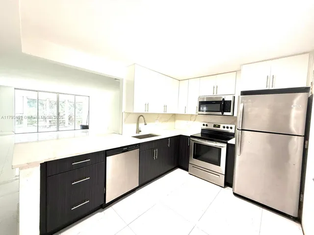 $245,000 | 1401 Northeast 191st Street, Unit D201, Miami, FL 33179