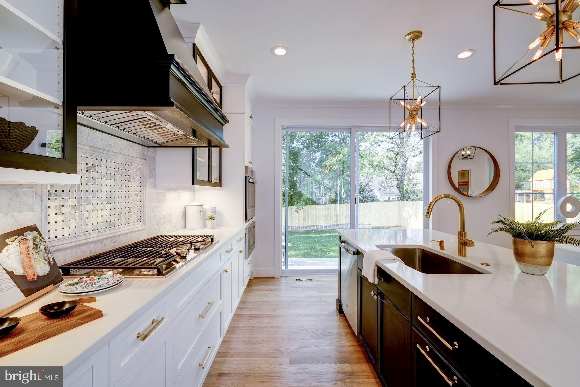 9506 Seminole Street Silver Spring, MD 20901 - Photo 22 of 64 Black and White Kitchen with Gold Accents