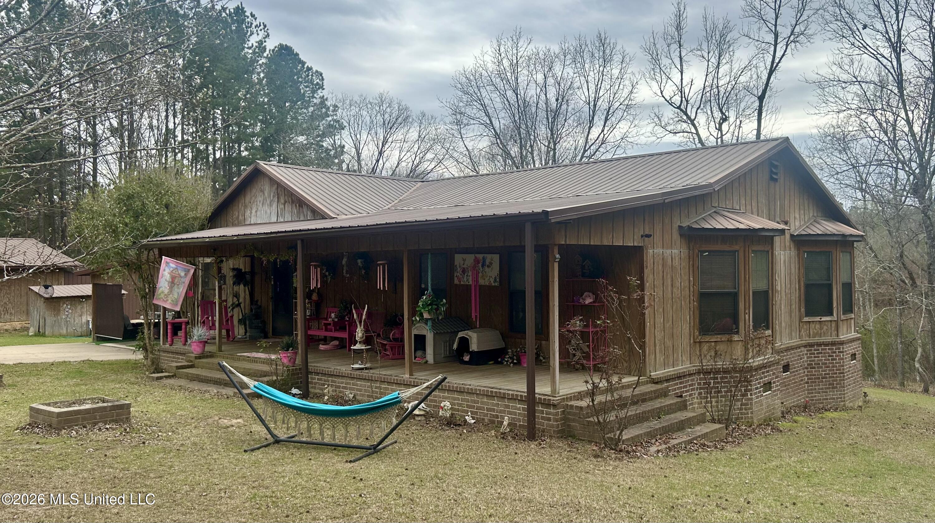 464 Felps Lane Southwest Brookhaven, MS 39601 - Photo 11 of 22 front porch and side