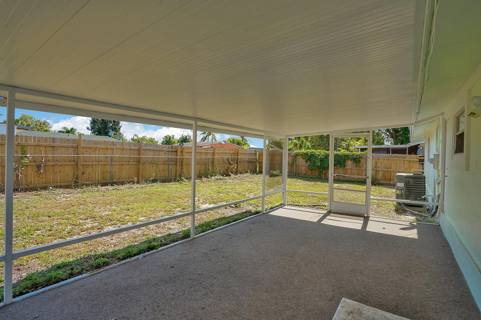 3891 Mackinac Road Lake Worth, FL 33462 - Photo 17 of 21 Large screen porch