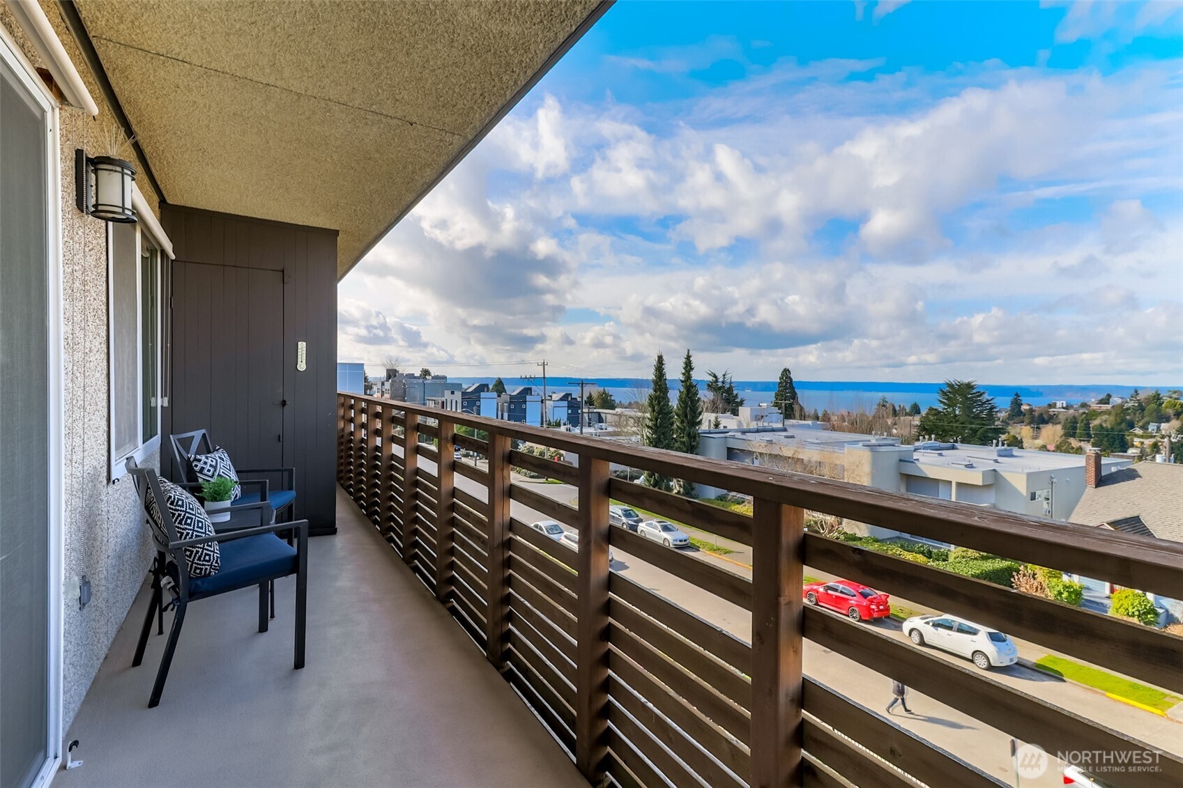 4444 44th Avenue Southwest, Unit 405 Seattle, WA 98116 - Photo 15 of 32 a view of city from a balcony