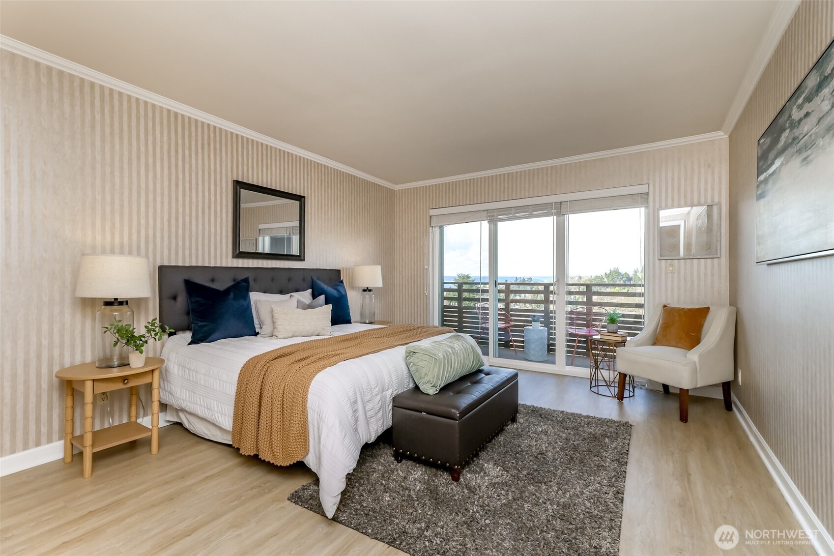 4444 44th Avenue Southwest, Unit 405 Seattle, WA 98116 - Photo 18 of 32 a bedroom with bed and large window
