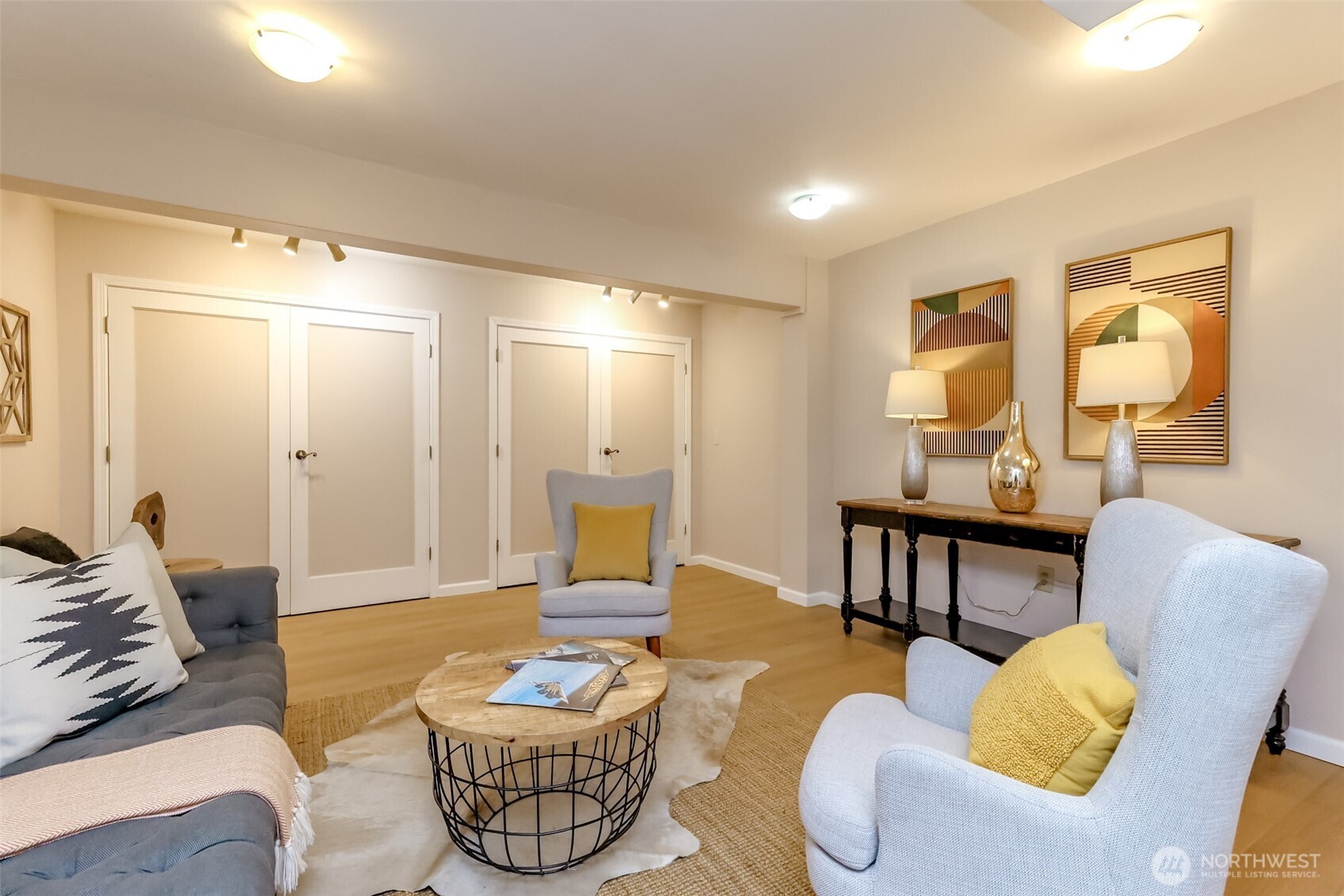 4444 44th Avenue Southwest, Unit 405 Seattle, WA 98116 - Photo 27 of 32 a living room with furniture and a table