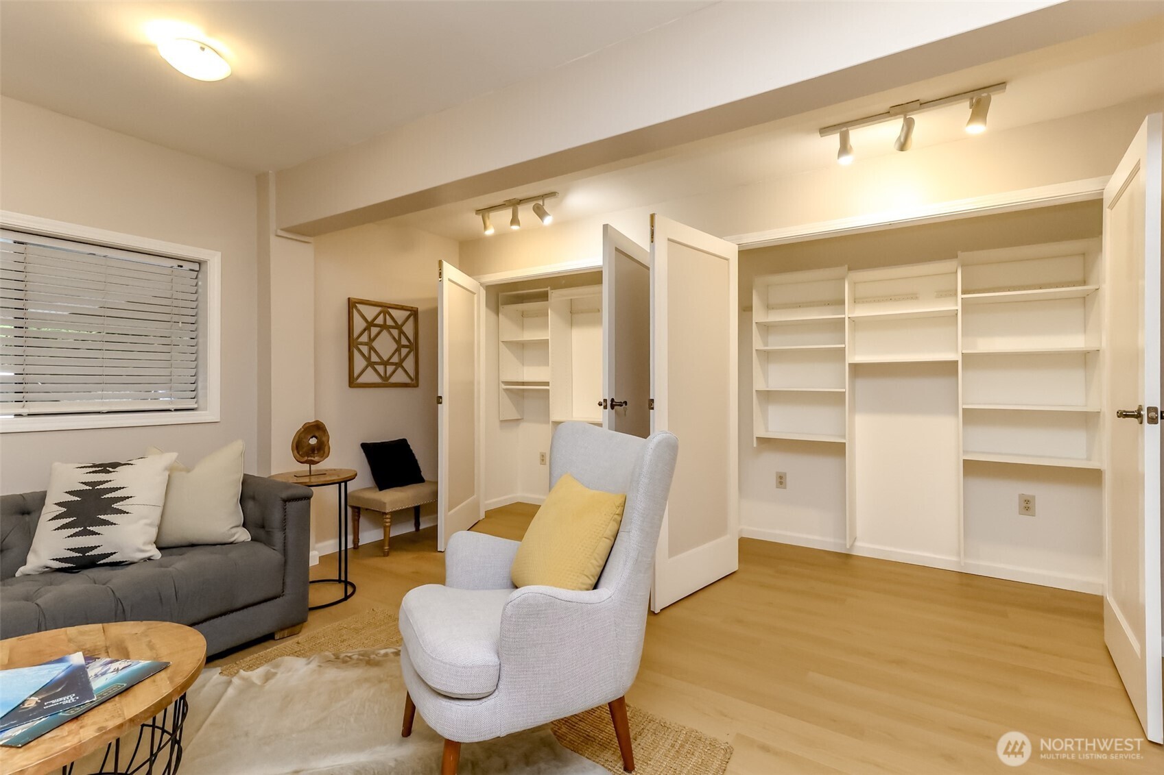 4444 44th Avenue Southwest, Unit 405 Seattle, WA 98116 - Photo 28 of 32 a living room with furniture and a large window