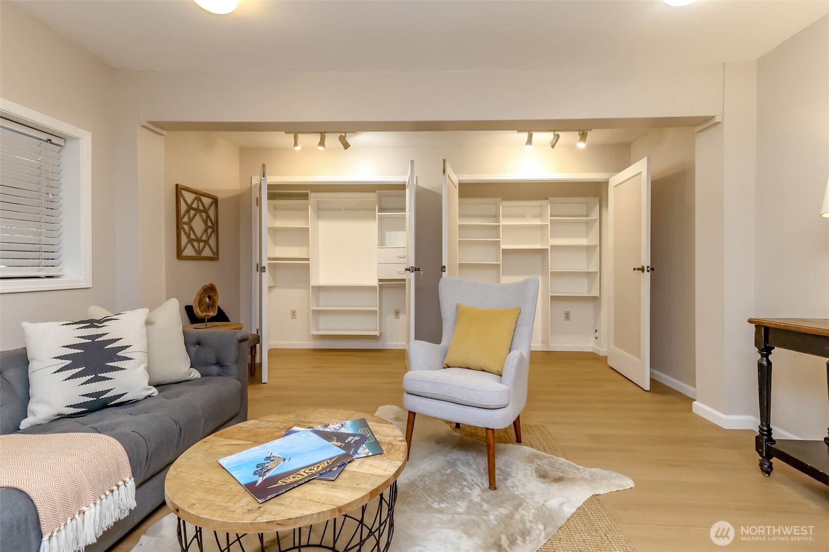 4444 44th Avenue Southwest, Unit 405 Seattle, WA 98116 - Photo 29 of 32 a living room with furniture and a large window