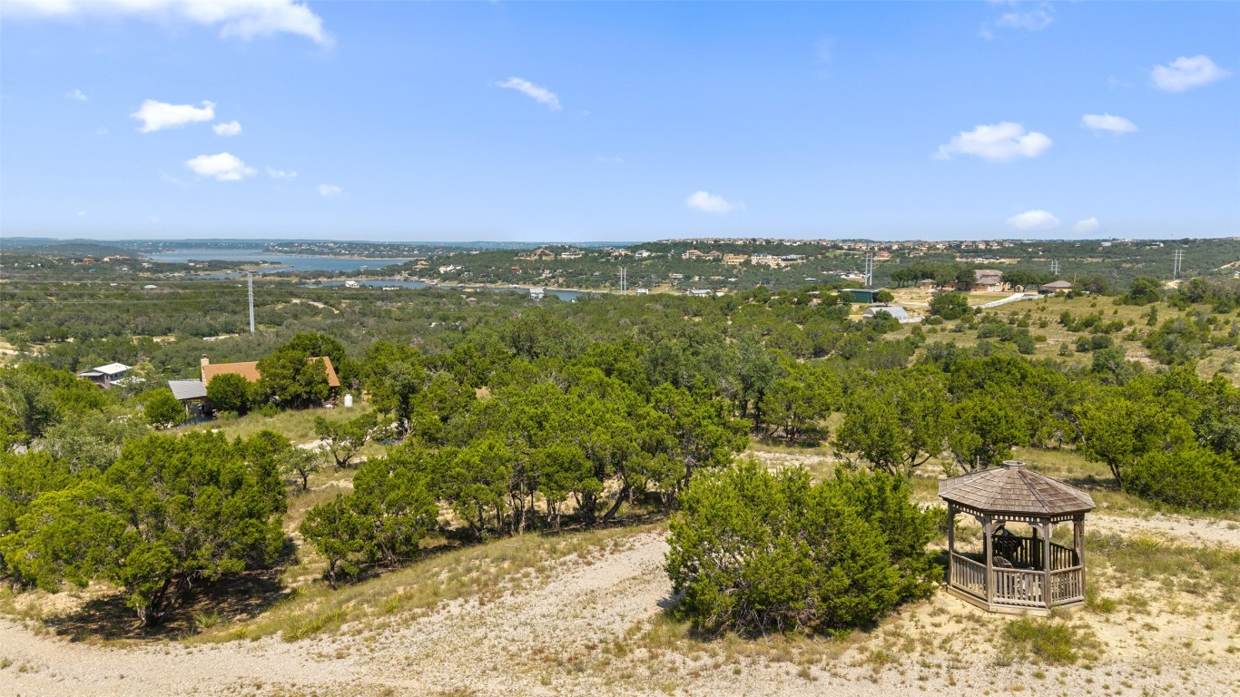 3301 R O Drive Spicewood, TX 78669 - Photo 19 of 37 a view of a city from a yard