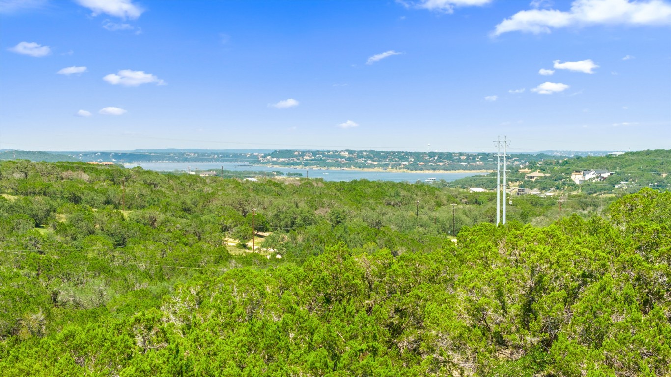 3301 R O Drive Spicewood, TX 78669 - Photo 27 of 37 a view of an ocean and a yard