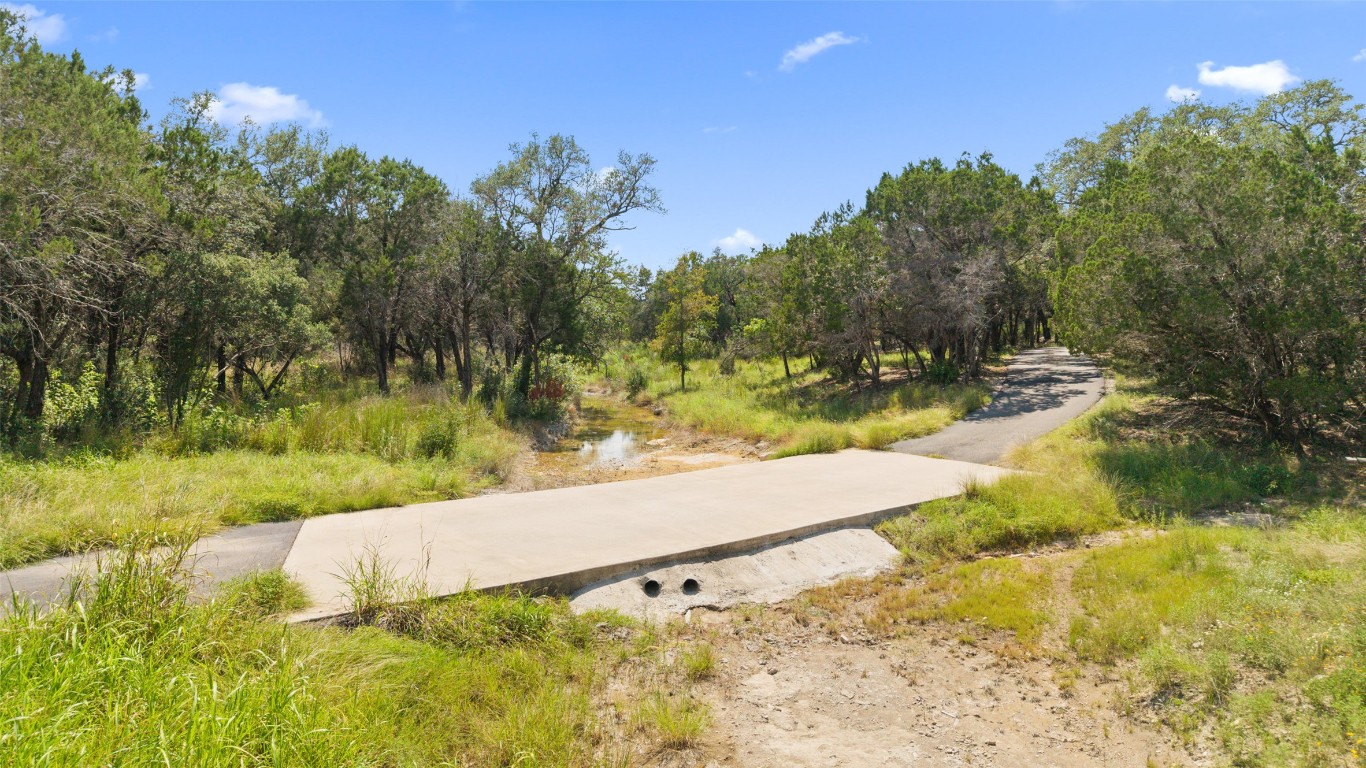 3301 R O Drive Spicewood, TX 78669 - Photo 34 of 37 a view of a yard with an outdoor space