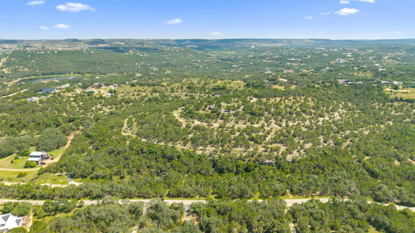 3301 R O Drive Spicewood, TX 78669 - Photo 4 of 37 a view of a city with lush green forest