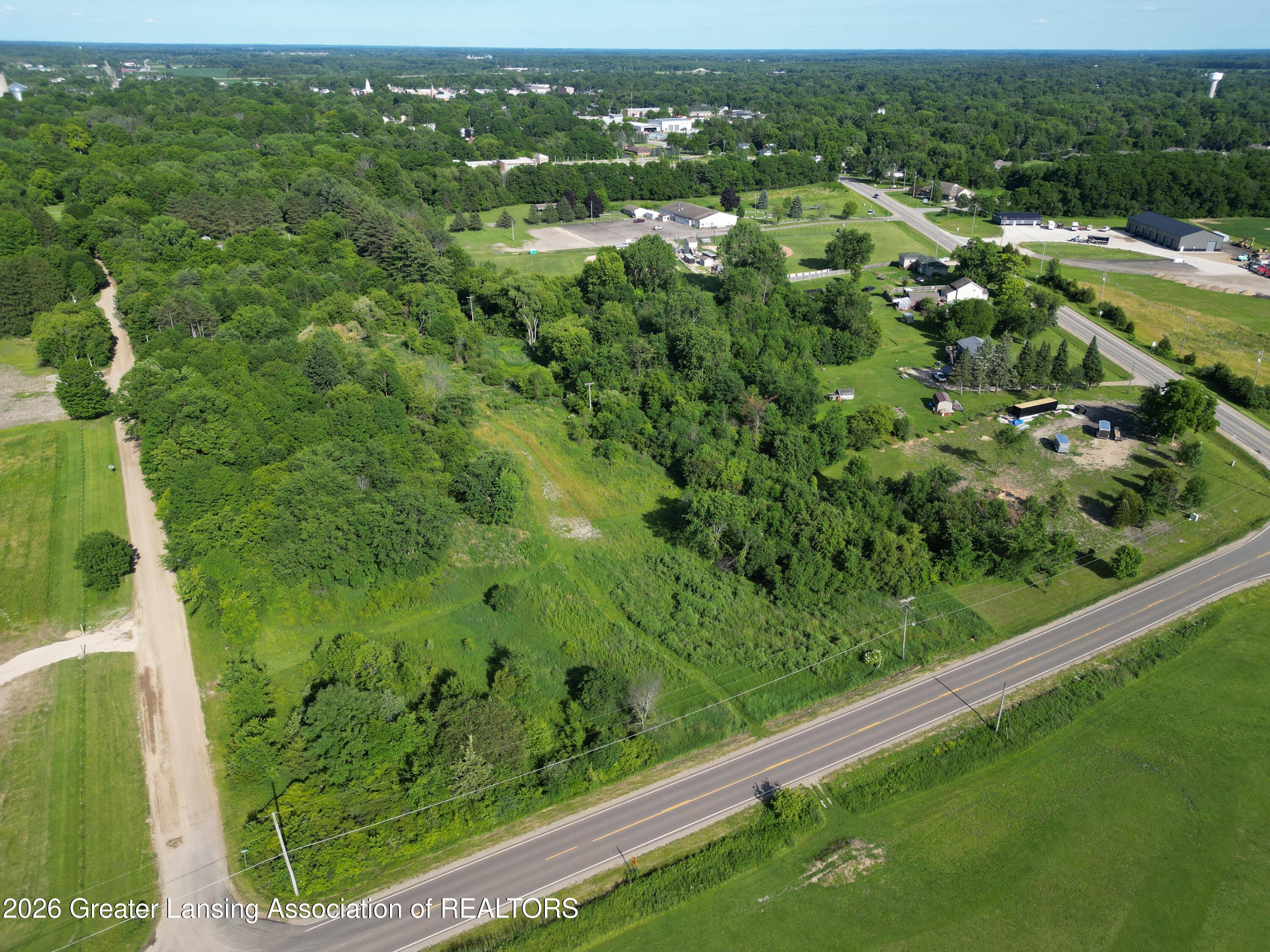 975 Foote Street Charlotte, MI 48813 - Photo 2 of 28 dji_fly_20260627_180716_17_1782598501930