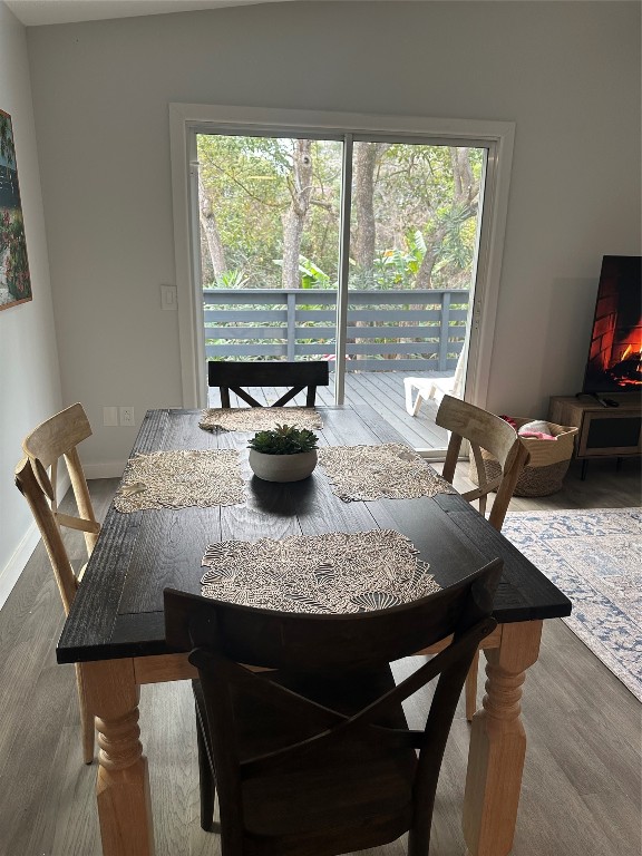 514 South 4th Street Fernandina Beach, FL 32034 - Photo 6 of 13 a view of a dining table and chairs in the patio