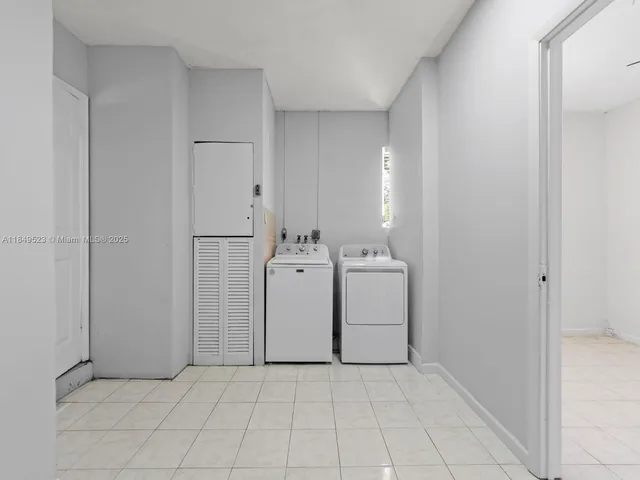 a view of a bathroom with utility room