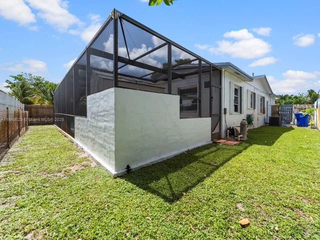 a house view with a garden space