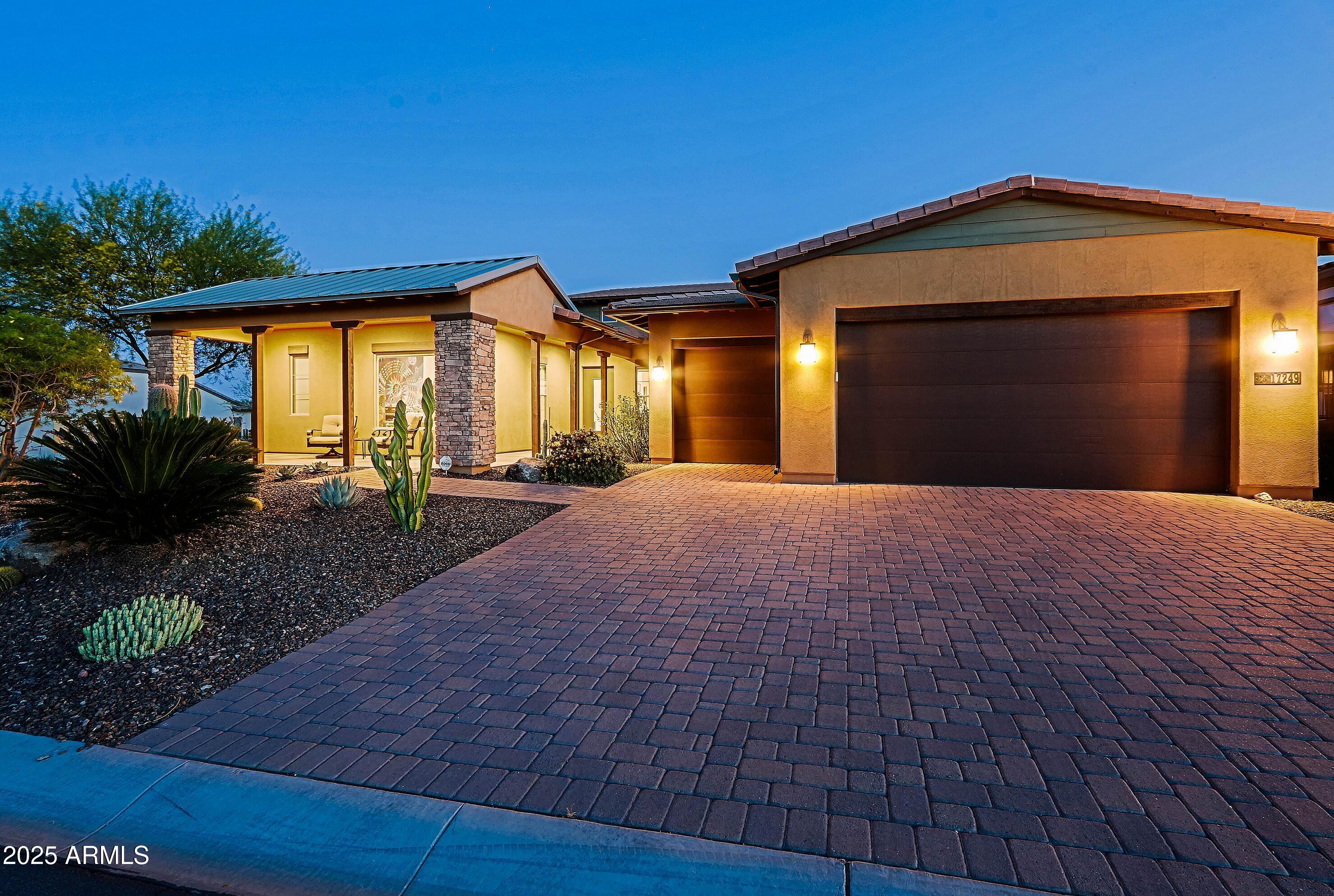17249 East Fort Verde Road Rio Verde, AZ 85263 - Photo 2 of 48 a view of a house with a porch
