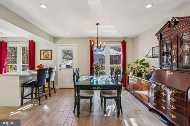 a kitchen with stainless steel appliances a refrigerator and a counter space