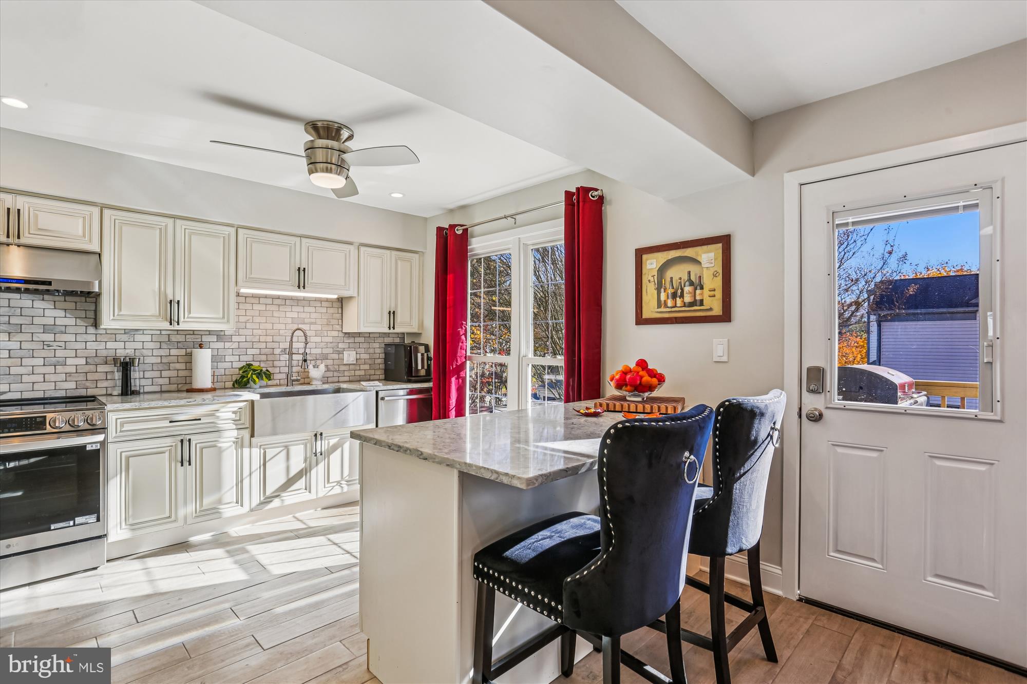 20510 Bargene Way Germantown, MD 20874 - Photo 16 of 97 Redesigned kitchen. Wall removed. Island/bar added