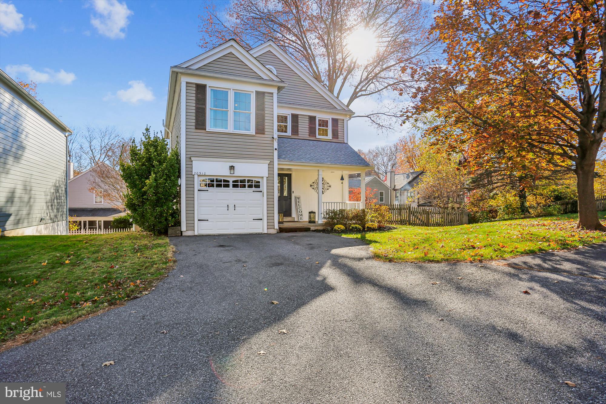20510 Bargene Way Germantown, MD 20874 - Photo 2 of 97 a view of a house with a big yard and large trees