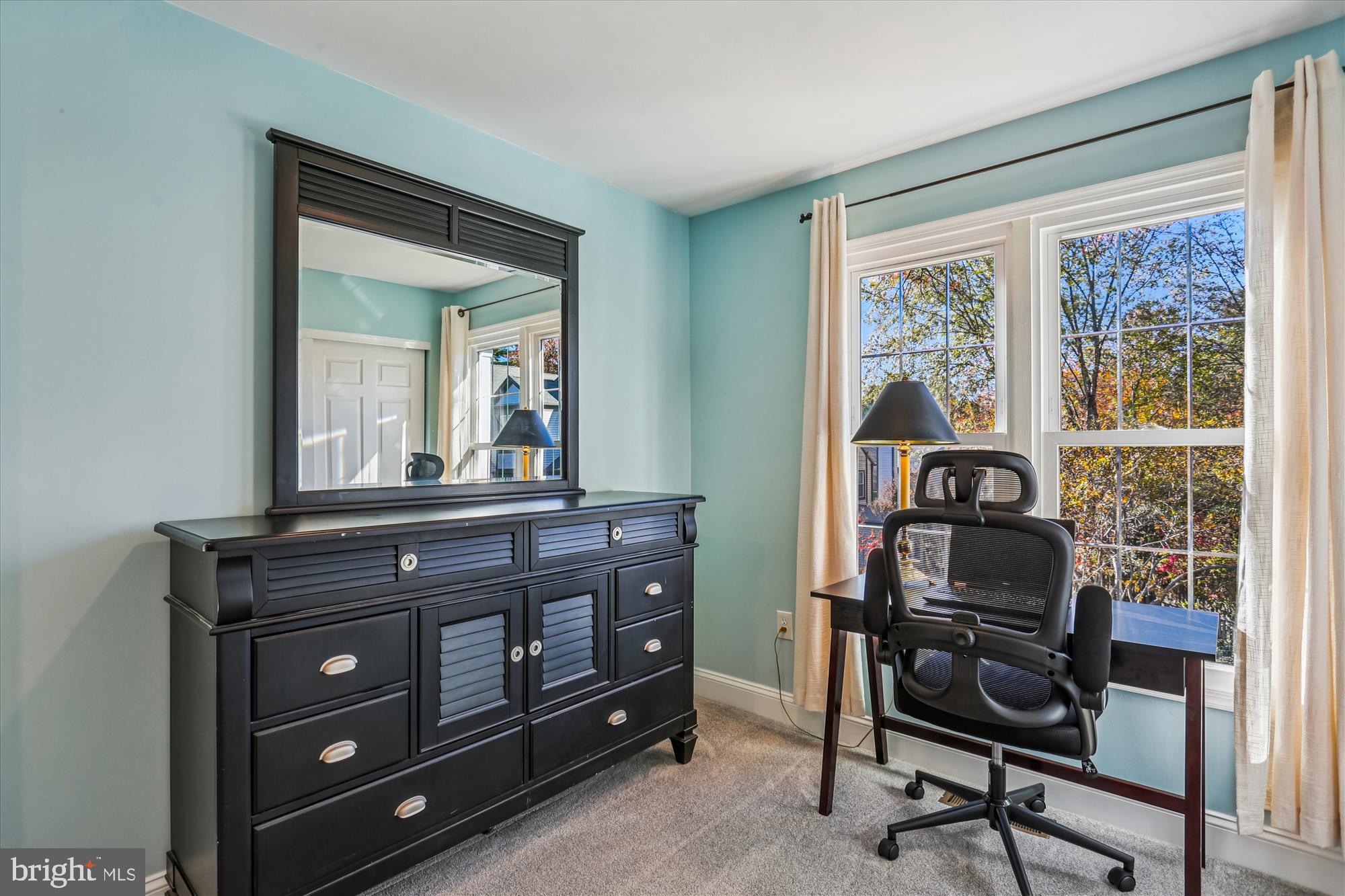 20510 Bargene Way Germantown, MD 20874 - Photo 31 of 97 a view of a workspace with furniture and a window