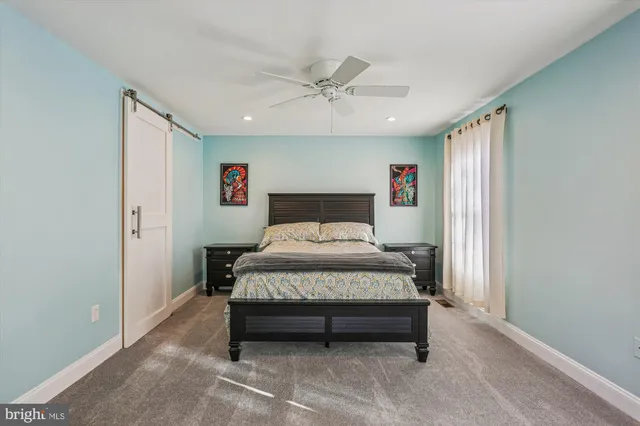 a view of balcony with wooden floor and fence