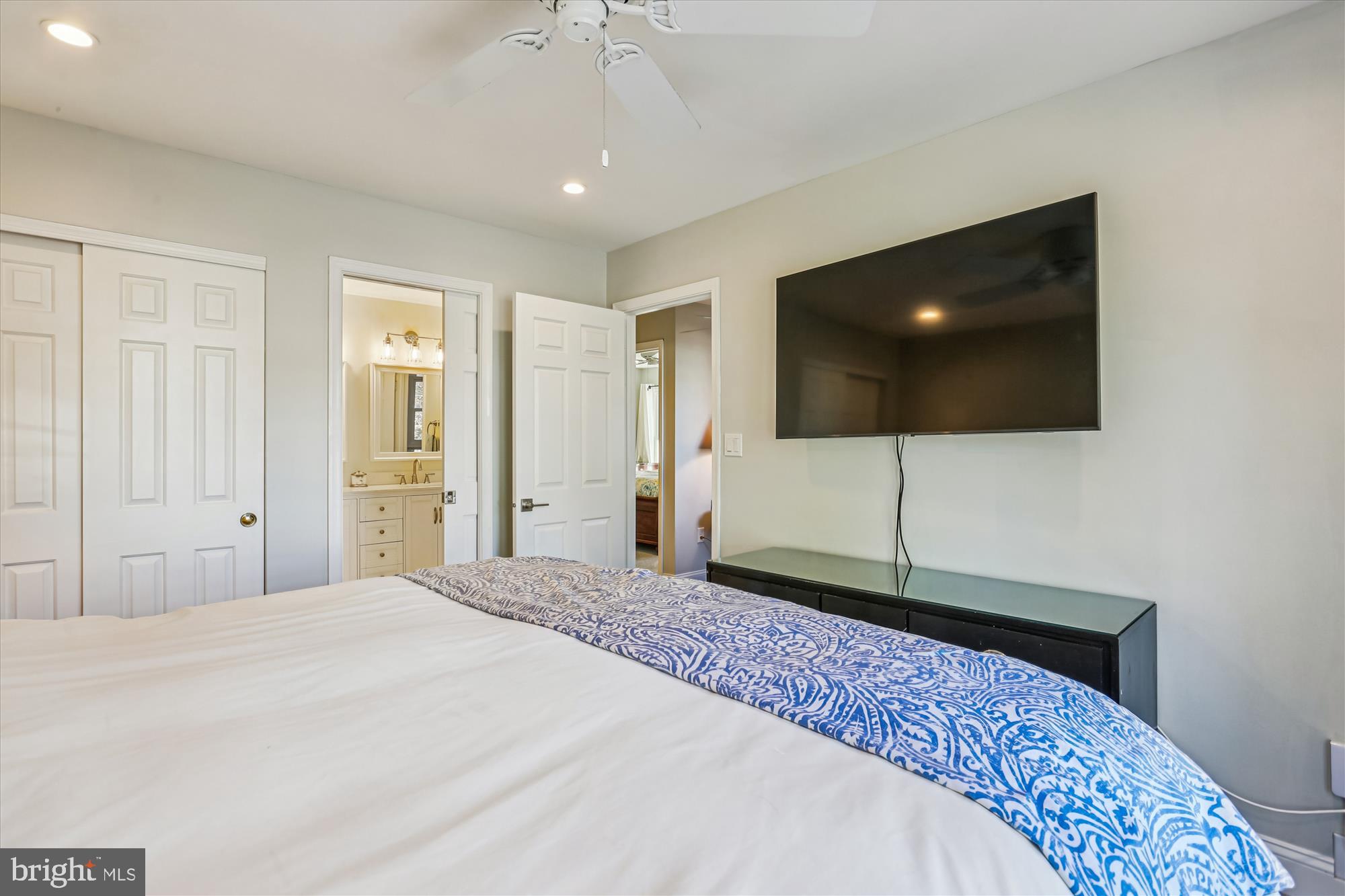 20510 Bargene Way Germantown, MD 20874 - Photo 37 of 97 a bedroom with a bed and a flat screen tv