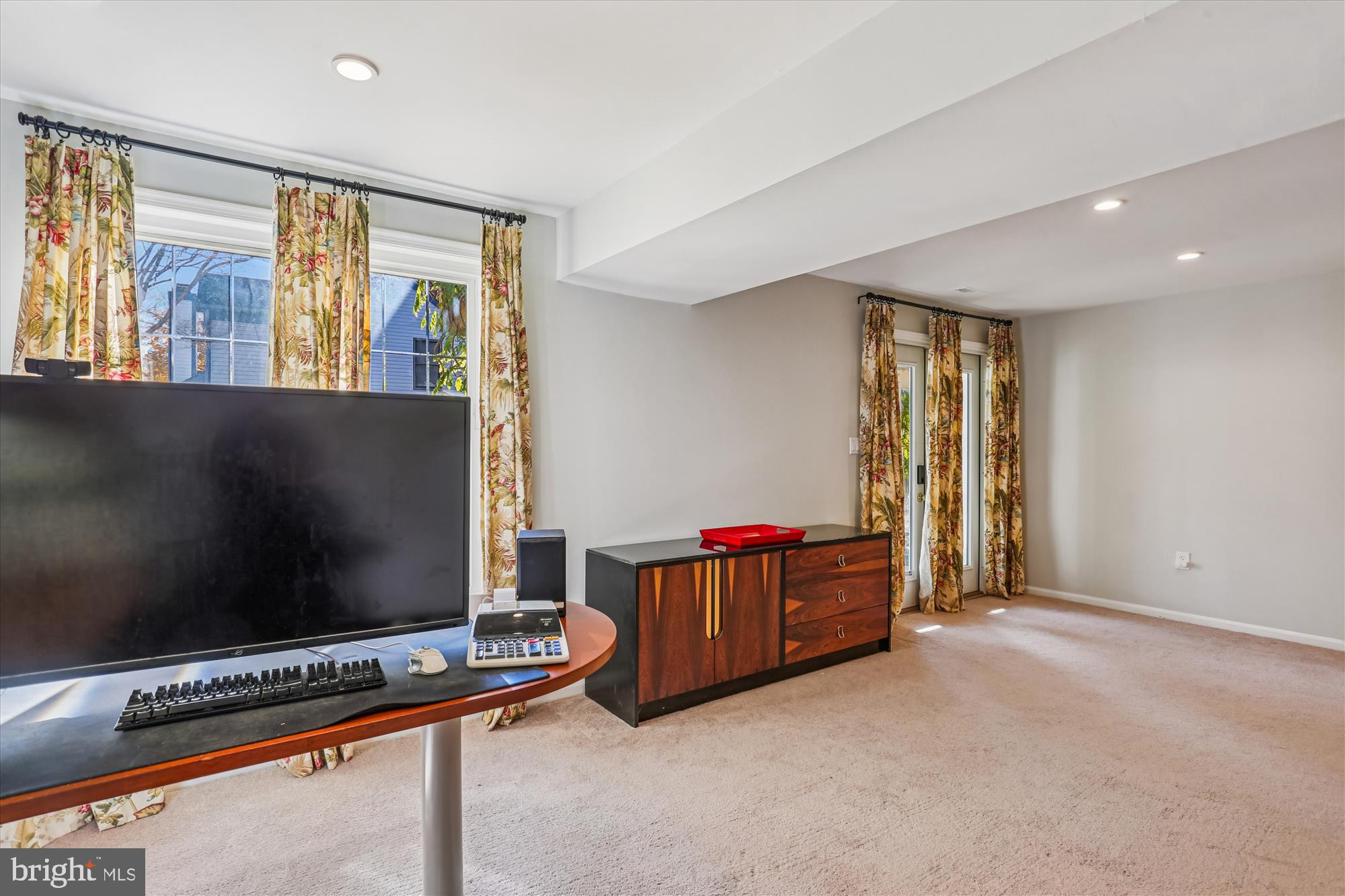 20510 Bargene Way Germantown, MD 20874 - Photo 55 of 97 a living room with furniture and a flat screen tv