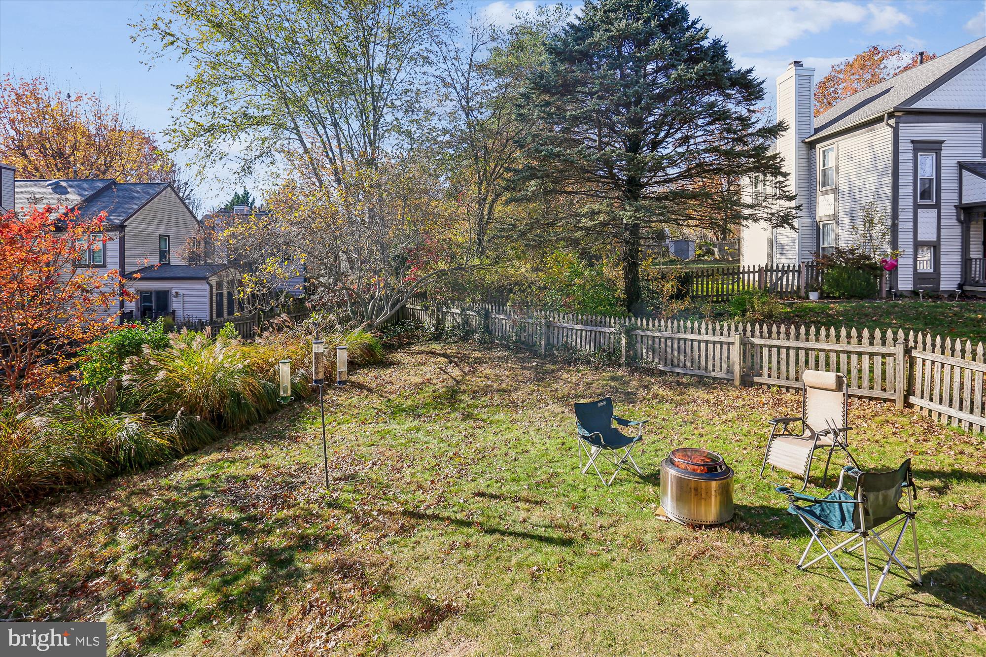 20510 Bargene Way Germantown, MD 20874 - Photo 75 of 97 a view of a chair and table and potted on the side of the house